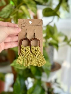 Get your free-spirit boho vibe on with these fun handmade macrame fringe earrings!  These bohemian earrings were carefully hand knotted using soft recycled cotton cord on a wood piece. These dangle earrings are very lightweight. Makes the perfect gift for the hippie girl in your life.  Handmade with love in the USA.  *Nickel free earrings. Handmade with eco-friendly materials! I use high quality cord made from recycled cotton.  ** Attention local buyers ** If you prefer to arrange for in-person pick up instead of having your item shipped to you, please message me after placing your order and I can refund any shipping costs where applicable. Macrame Earrings, wood earrings, bohemian jewelry earrings, boho jewelry for women, boho earrings dangle, fringe earrings, hippie jewelry, gifts for wo Adjustable Brown Bohemian Tassel Earrings, Bohemian Adjustable Tassel Earrings With Fringe, Adjustable Bohemian Tassel Earrings With Fringe, Brown Bohemian Tassel Earrings, Bohemian Brown Tassel Earrings, Bohemian Adjustable Macrame Tassel Earrings, Bohemian Macrame Tassel Earrings, Bohemian Macrame Tassel Dangle Earrings, Handmade Adjustable Bohemian Tassel Earrings