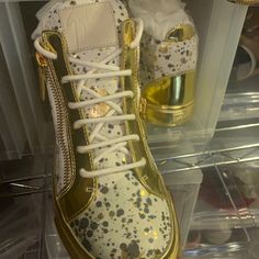 Gold And White Painted Look Giuseppe Zanotti Sneakers, Never Worn, With Dust Bags And Box Luxury Gold Lace-up Custom Sneakers, Designer Metallic Low-top Sneakers, Designer Gold Low-top Custom Sneakers, Designer Gold Custom Low-top Sneakers, Designer Gold High-top Sneakers, Designer Gold Lace-up Sneakers, Luxury Gold Custom Sneakers With Round Toe, Luxury Silver Custom Sneakers, Designer Round Toe Sneakers For Party