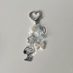 a keychain with charms attached to it