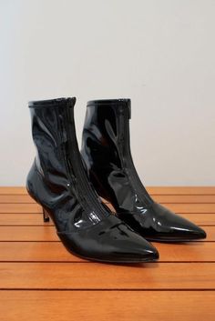 Gianvito Rossi Zip-Front 55 Ankle Boots Black Vinyl Size 36.5 Kitten Heel - Gently worn. Good condition. No major flaws, light wear on tips of toes. Scuff on left heel above pin. Boots are wrinkled where toes bend when walking. Comes with dustbag. Retails for $1,095! How To Wear Ankle Boots, Gucci Bamboo, Ankle Boots Black, Fashion 101, Sweater Set, Black Vinyl, Kitten Heel, Metallic Leather, Black Cardigan