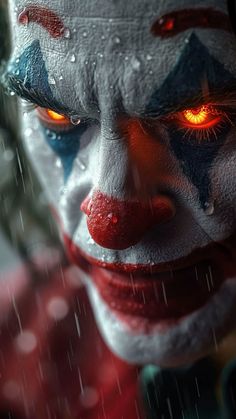 a close up of a clown's face with red eyes and white makeup, in the rain