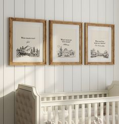 three framed pictures hang on the wall above a crib in a white nursery room