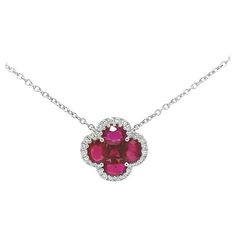 Looking for a unique and unforgettable gift? Look no further! This exquisite Ruby flower, accented with a small Diamond Oval& Princess Cut Shaped, is set in 18k white gold with an adjustable sizing lock and is perfect for any special occasion. Whether it's an anniversary, Valentine's Day, or birthday, this one-of-a-kind piece is sure to make your loved one feel truly special. Ruby Flower: 1.90Ct, 4 Oval Shape, 1 Princess Cut Diamond: 0.24Ct, RDB, E-F Color, VS Clarity Made in New York City Ruby Flower, Princess Cut Diamond, Princess Cut Diamonds, Oval Diamond, Flower Necklace, San Valentino, Princess Cut, Oval Shape, Jewelry Necklace Pendant