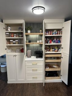 the pantry is stocked with all kinds of food