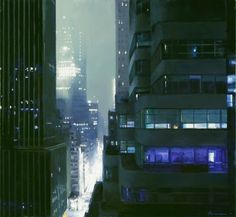 a city at night with tall buildings and street lights