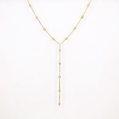 "14k Gold Bead Chain Y Drop Necklace, Beads by Yard Y-Drop Chain Necklace, 14K Solid Gold Lariat Chain Necklace, Gold Chain Beaded Necklace ≫ Product Details ◈ Handmade in the U.S.A. ◈ Weight: 4g ◈ Metal: 14K Solid Gold (18K also available - Additional fees may apply) ◈ Gold Color: Rose Gold, Yellow Gold, White Gold ◈ Chain Length: 16\" + 4\", 18\" + 4\" ◈ Bead Size: 3mm x 5mm ≫ Please read our FAQ below for more detail." Elegant Yellow Gold Necklaces With Dangling Beads, Gold Lariat Necklace With Dangling Beads For Gifts, Elegant Lariat Necklace With Gold Beads, Lariat Necklace With Dangling Beads For Gift, Gift Lariat Necklace With Dangling Beads, 14k Gold Necklace With Delicate Long Drop Chain, Long Drop Yellow Gold Necklace With Delicate Chain, Dainty Yellow Gold Backdrop Necklace With Long Drop, Beaded Chain Lariat Necklace