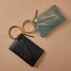 This style pairs soft leather with beautiful hardware for the ultimate luxe clutch. Brushed Gold Hardware, Large Wallet, Shooting Stars, Womens Purses, Kids Sleepwear, Brass Hardware, Pebbled Leather, Gold Hardware, Suede Leather