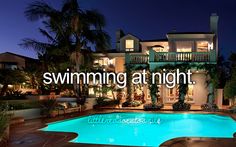 the swimming pool is lit up at night with words above it that read, swimming at night