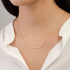 "Introducing our Signature Name Necklace, a personalized masterpiece. Crafted with meticulous care, this necklace features your unique signature beautifully transformed into a pendant. The dainty chain adds a touch of elegance, ideal for daily wear or special occasions. Express your individuality or immortalize a loved one's handwriting. Whether a meaningful gift or a personal indulgence, our Signature Name Necklace is a true reflection of identity and style, making it a timeless addition to your jewelry collection. The Perfect Gift: This is the ideal gift for girlfriends, moms, sisters, or any woman for any holiday or occasion, such as anniversaries, birthdays, Valentine's Day, or Mother's Day. Material: * Material: High-quality solid 925 Sterling Silver * Plating: Sterling Silver, 18K Go Personalized Name Pendant Necklace, Personalized Rose Gold Elegant Necklace, Elegant Personalized Rose Gold Necklace, Custom Name Pendant Necklace For Mom, Customizable Rose Gold Pendant Necklace, White Gold Nameplate Necklace For Personalized Gift, Round Pendant Name Necklace For Personalized Gift, Elegant Customized Charm Necklaces For Gift, Elegant Customized Charm Necklace For Gift