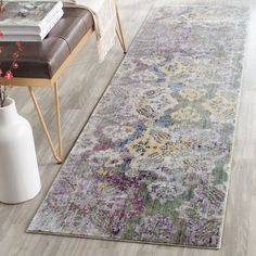 an area rug with various colors and patterns