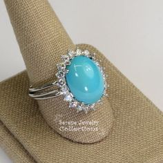 Beautiful Persian Turquoise diamond ring, it has not been stabilized. Brilliant round diamonds encircle the turquoise.Ring Size: 11Total Weight: 11.92 gramsPrecious Metal: PlatinumPrecious stones:-Sleeping Beauty Turquoise Center Stone: 16.4mm x 12.7mm-White Round Diamonds: 1.6 carats Turquoise Diamond Ring, Turquoise Diamond Rings, Persian Turquoise, Platinum Diamond Rings, Brooch Bouquets, Sleeping Beauty Turquoise, Platinum Ring, Vintage Ring, Ring Vintage