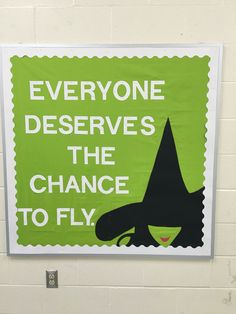 there is a sign on the wall that says everyone deserves the chance to fly,