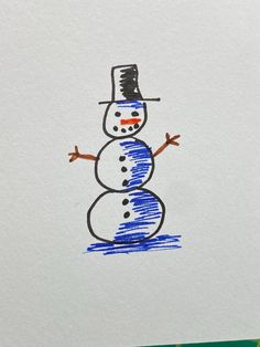 a drawing of a snowman on paper