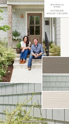 two people sitting on steps in front of a house with gray siding and white trim