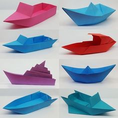 several different colored paper boats sitting on top of each other