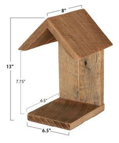 a wooden bird house is shown with measurements