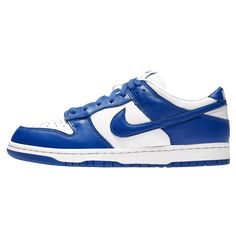 Celebrating the silhouette’s 35th anniversary, the Dunk Low Retro SP ‘Kentucky’ borrows a familiar color scheme from Nike’s legendary ‘Be True to Your School’ series from 1985. The high-top basketball shoe originally made for the University of Kentucky is updated as a versatile low-top, featuring a white leather upper with royal blue overlays. A breathable mesh tongue is topped with a woven Nike tag, complementing a second Nike logo hit on the heel tab. Royal Blue Dunks, Blue And White Nike Dunks, Dunk Low Kentucky, Nike Dunk Low Kentucky, School Series, High Top Basketball Shoes, Tenis Nike, Concert Outfits, 35th Anniversary