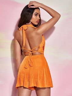 Look sophisticated in this Draped Front Backless Halter Neck Romper. Styled with a spaghetti strap neckline, plain pattern type, and sleeves, this romper is crafted of 91% polyester and 9% elastane with a slight stretch for a comfortable fit. Featuring crisscross, lace-up, and grommet eyelet details, this romper is perfect for your warmer-weather wardrobe. Enjoy a stylish, casual look with this short, unlined, and non-sheer romper. Specifications: Neckline: Spaghetti Strap Pattern Type: Plain Sleeve Length: Sleeveless Details: Criss Cross, Lace Up, Grommet Eyelet Length: Short Belt: No Fabric: Slight Stretch Composition: 91% Polyester, 9% Elastane Care Instructions: Machine wash or professional dry clean Body: Unlined Sheer: No Size Chart(cm): Size Bust Hip Size Length Shoulder Thigh Waist Look Sophisticated, Comfy Jumpsuits, Clean Body, Fabric Suppliers, Black Romper, Halter Neck, Criss Cross, Casual Looks, Spaghetti Strap