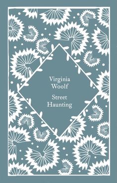 the virginia wool street hanging logo on a blue background with white flowers and green leaves