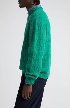 Brushed wool brings luxurious softness and comfort to a classic cable-knit sweater in a roomy fit that works layered or on its own. 26" length (size Medium) Crewneck Long sleeves Ribbed cuffs and hem 100% wool Dry clean Made in the UK Designer Clothing Classic Green Textured Knit Sweater, Green Wool Sweater With Textured Knit, Green Wool Cable Knit Sweater, Green Wool Textured Knit Sweater, Fall Mohair Cable Knit Sweater, Cozy Cable Knit Merino Wool Sweater, Green Textured Wool Sweater, Classic Green Cable Knit Sweater, Green Cable Knit Turtleneck Sweater