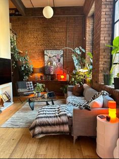 a living room filled with furniture and lots of windows