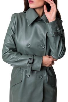 Green leather trench coat Double-breasted Leather Jacket For Fall, Fall Double-breasted Leather Jacket, Leather Jacket With Double Button Closure For Winter, Leather Pea Coat For Business In Fall, Soft Leather Outerwear For Winter Workwear, Fall Leather Pea Coat For Business, Fall Leather Long Coat With Double Button Closure, Fall Leather Pea Coat With Double Button Closure, Leather Pea Coat With Double Button Closure For Fall