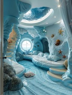 a bedroom with blue walls and white bedding is decorated in an underwater world style