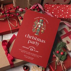 a christmas party flyer with presents and decorations on the table in front of red wrapping paper