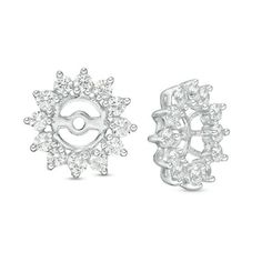 Vary the look of your gemstone or diamond stud earrings with these shimmering diamond earring jackets. Fashioned in 14K white gold, each jacket features a brilliant sunburst spray of diamonds. Simply slip your favorite stud ear post through the jacket and secure for an instant update. Designed to be used with diamond studs up to 1-1/2 cts. t.w. or gemstone studs up to 6.0mm in size, these jackets sparkle with 1 ct. t.w. of diamonds and a bright polished shine. Stud earrings are sold separately. Diamond Earring Jackets, Earring Jackets, Diamond Earring, Diamond Stud Earrings, Gemstone Studs, Diamond Stud, Diamond Stone, Diamond Clarity, White Metal