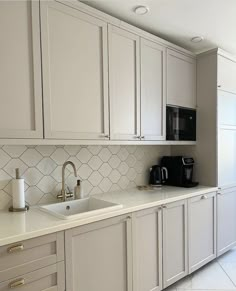 the kitchen is clean and ready for us to use in its new owner's home