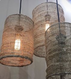 three hanging lights made out of woven material