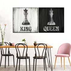 two canvases with the words king and queen on them in front of a dining room table