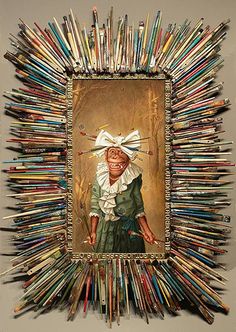 an art work with pencils in the shape of a woman's head and arms