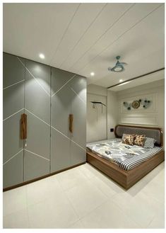 a bed sitting in the middle of a bedroom next to a closet