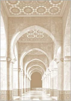 an ornate hallway with columns and arches