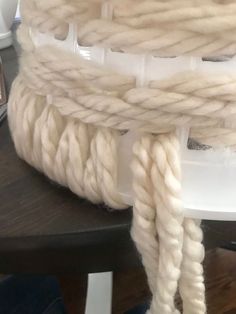 a chair with some white rope on it