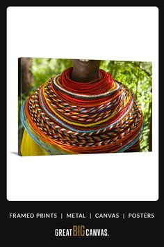 a woman holding a large stack of colorful rope wrapped around her neck with the words frame prints metal canvass posters