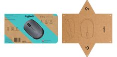 a computer mouse pad with a design on the front and back of it next to a cardboard box