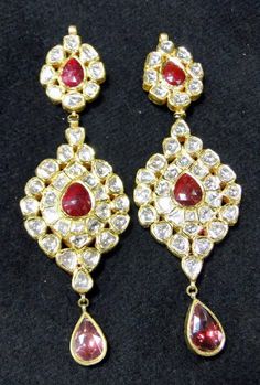 Glamorous Vintage show stopper Ideal party wear 22-carat solid gold, Old cut Diamonds and multicolor Enamel work (Kundan Meena) Earrings Pair. Length of earrings-11.5 cm, the width of earrings-3.5 cm, weight of earrings only-33.2 grams. Material-22 carat solid gold, genuine old cut clear Diamonds, and enamel work Gold Earrings With Stone Work For Ceremonial Occasions, Ceremonial Gold Earrings With Stone Work, Round Kundan Earrings With Zari Work, Kundan Earrings With Zari Work, Festivals Kundan Diamond Necklace With Meenakari, Diamond Kundan Necklace With Meenakari For Festivals, Ceremonial 22k Gold Meenakari Bridal Earrings, Traditional Yellow Gold Kundan Danglers, Festive Meenakari Kundan Diamond Necklace