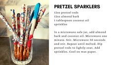 there are many toothbrushes in a glass vase on the table and one is labeled pretzel sparklers