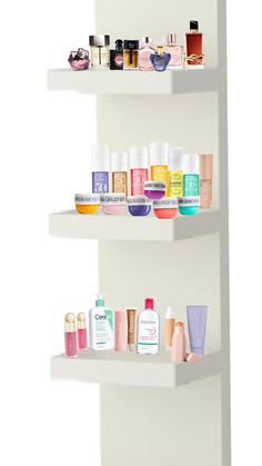 two white shelves filled with different types of beauty products