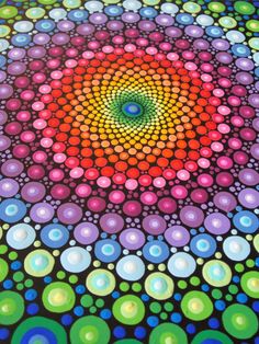 an abstract painting with circles and dots on it