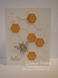 a close up of a greeting card with honeycombs and a bee on it