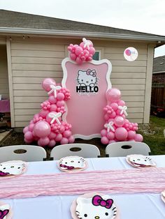 a hello kitty themed birthday party with balloons