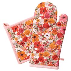 two oven mitts with flowers on them