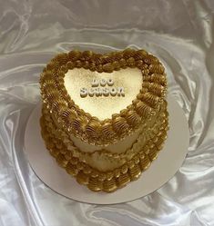 a heart shaped cake on a white plate