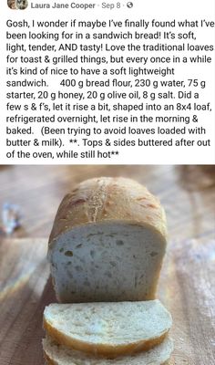 a loaf of bread sitting on top of a wooden cutting board