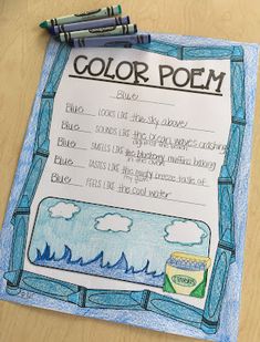 the color poem is displayed on top of a piece of paper with crayons next to it