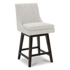 an upholstered bar stool with a wooden frame and seat cushion in white fabric