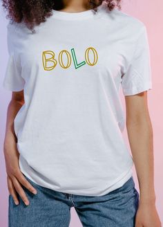 Set the trends with the super stylish slogan BOLO - Be On The Look Out All Eyes On You  - stylish, affordable + eye-catching unisex tee shirt with a smooth green + gold cursive text print. Boasting a unique modern design and a retro twist, BOLO is a ready to show off classic, short sleeve, crew neck tee shirt.   It comes in small to plus sizes, with free shipping so you don't miss out. We believe that fashion should be unique to you, whilst being fun, playful, colourful and expressive.  So what Cursive Text, Slogan Shirts, Text Print, Layered Streetwear, Trendy Tee, Streetwear Outfits, Look Plus, All About Eyes, Crew Neck Tee